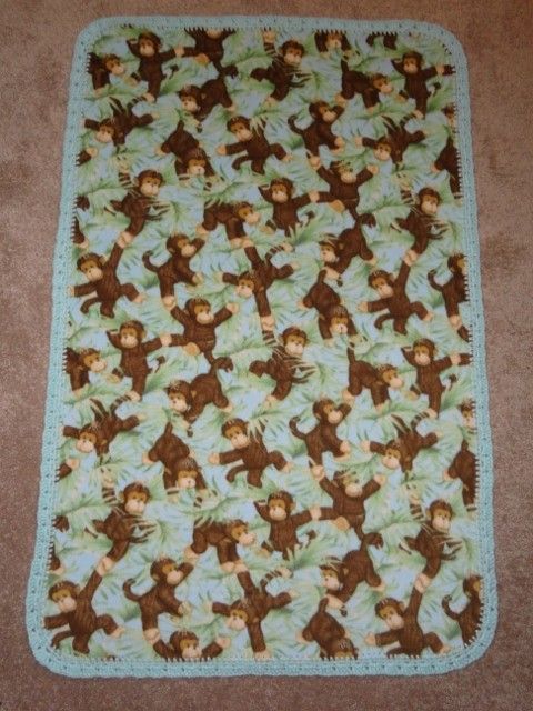 CRIB/NAP FLEECE BLANKET  A MEDLEY OF MONKEYS IN THE JUNGLE /28X46 