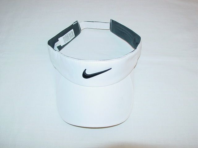   white visor velcro strap longer strap slides into right side for