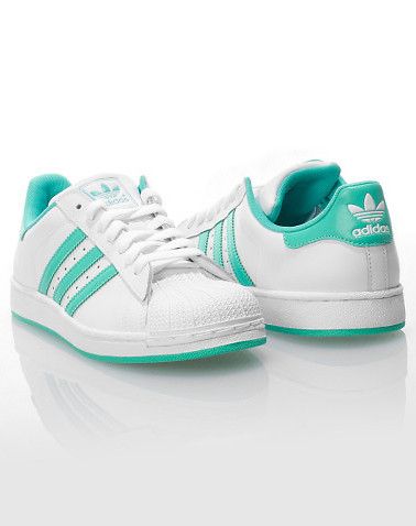   shell top toe trademark stripes along side adidas logo across back