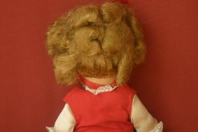 12 inch vintage horsman doll. Doll is Vinyl or plastic, implanted hair 