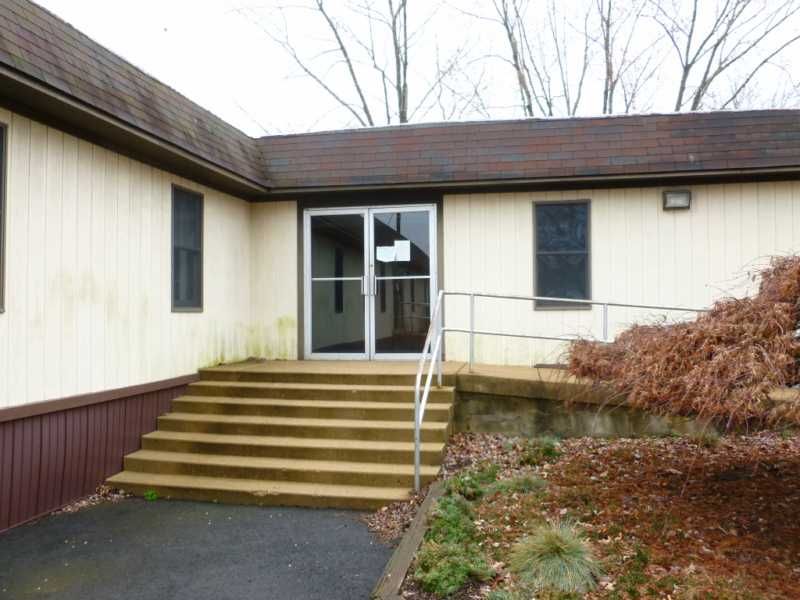 end south side west side entrance to kitchen concrete ramp