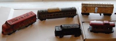   old, model train; rails; 3 cars; caboose; Southern Pacific 6000 engine
