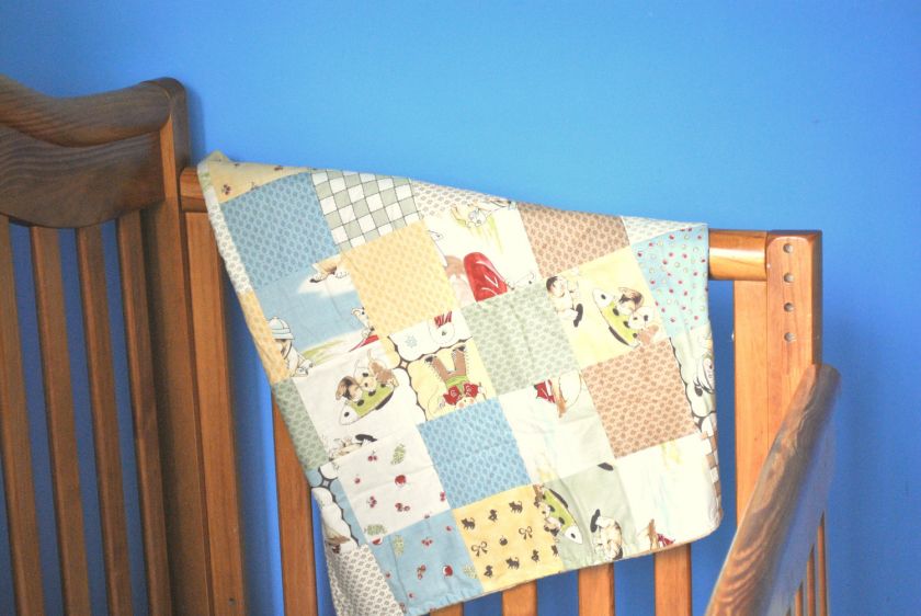  this is a designer handmade patchwork baby blanket 