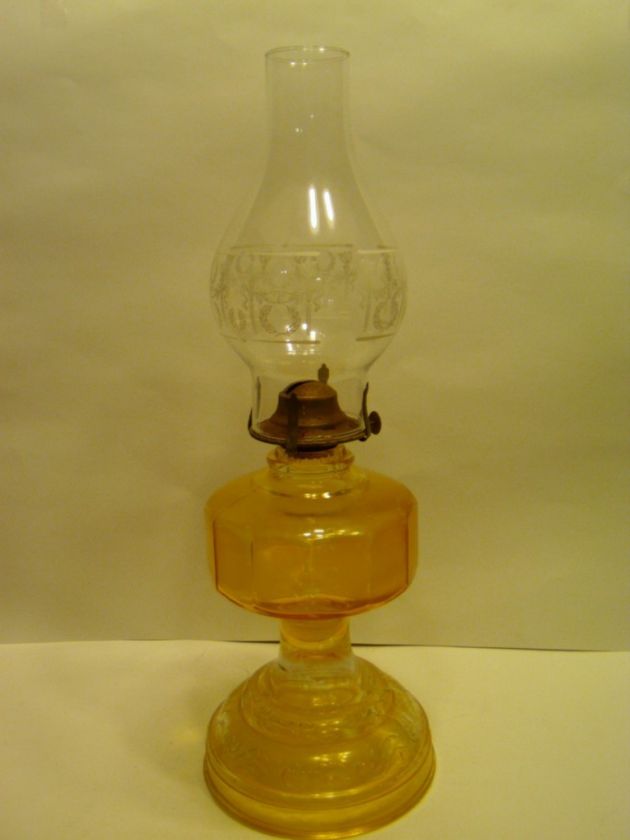   YELLOW GLASS KEROSENE LAMP OIL LAMP WITH CLEAR GLASS GLOBE  